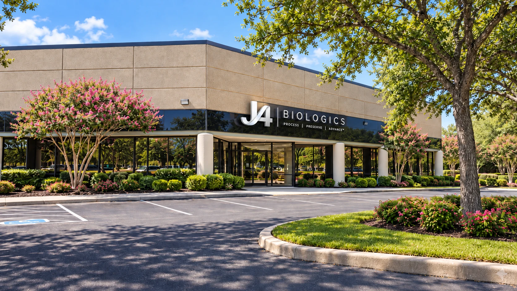 J4 Biologics building exterior with landscaped grounds