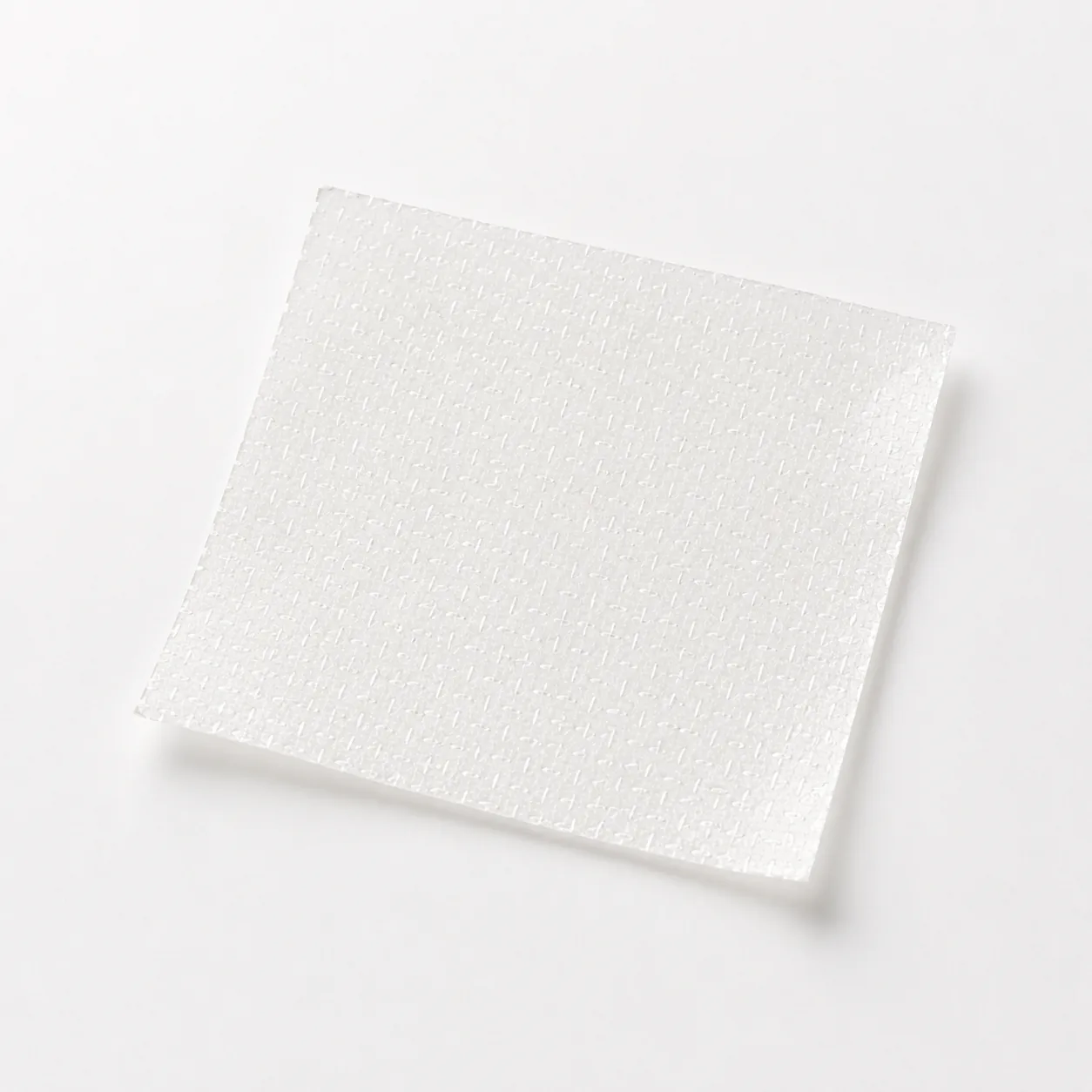 White square EvoPatch placental tissue patch with a textured surface